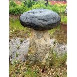 A Cotswold stone staddle stone - the top 45cm diameter, overall height 75 cm.