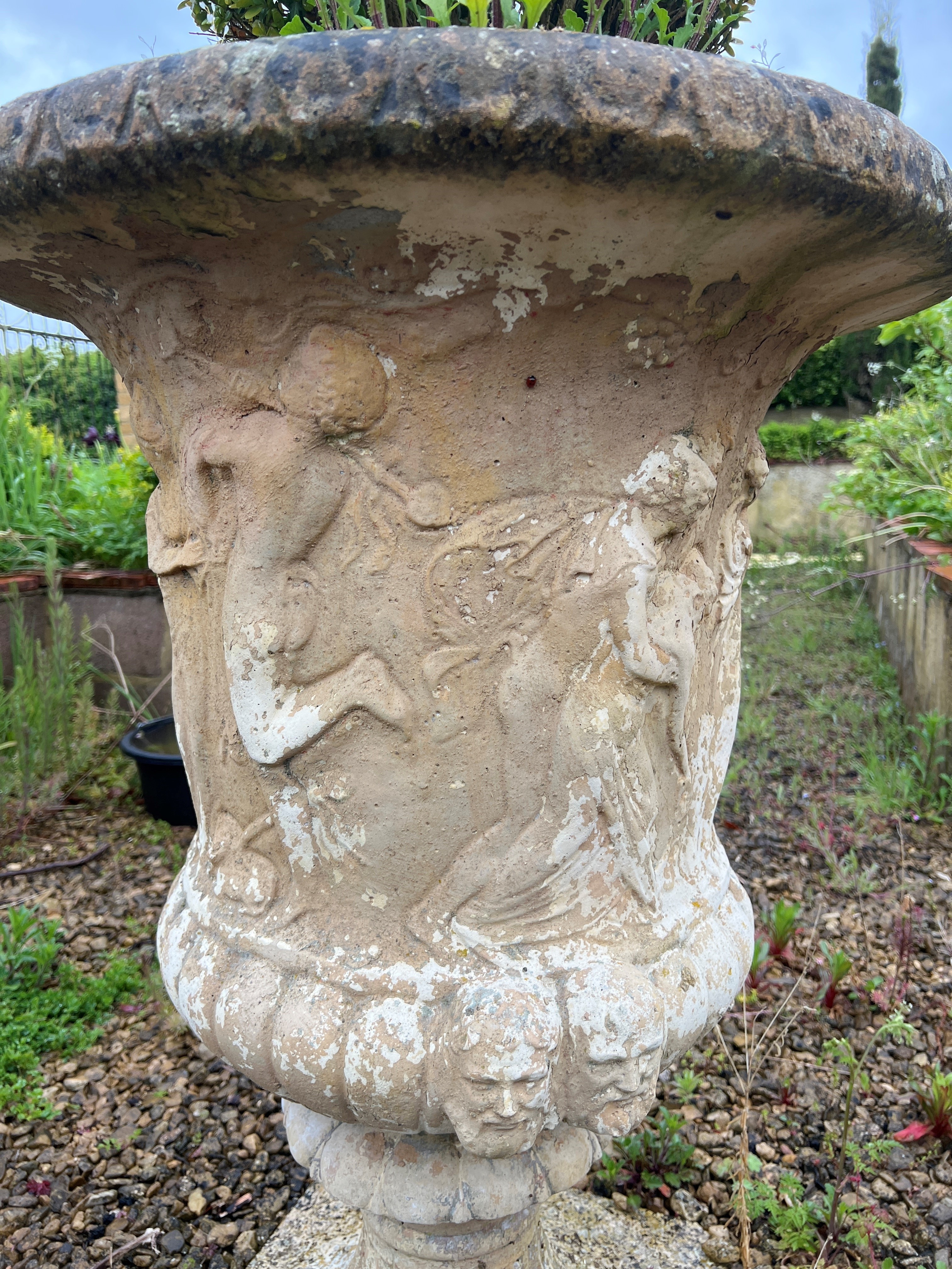 A composite stone garden urn - with figural and gadrooned decoration, on a pedestal base, 60cm - Image 2 of 3