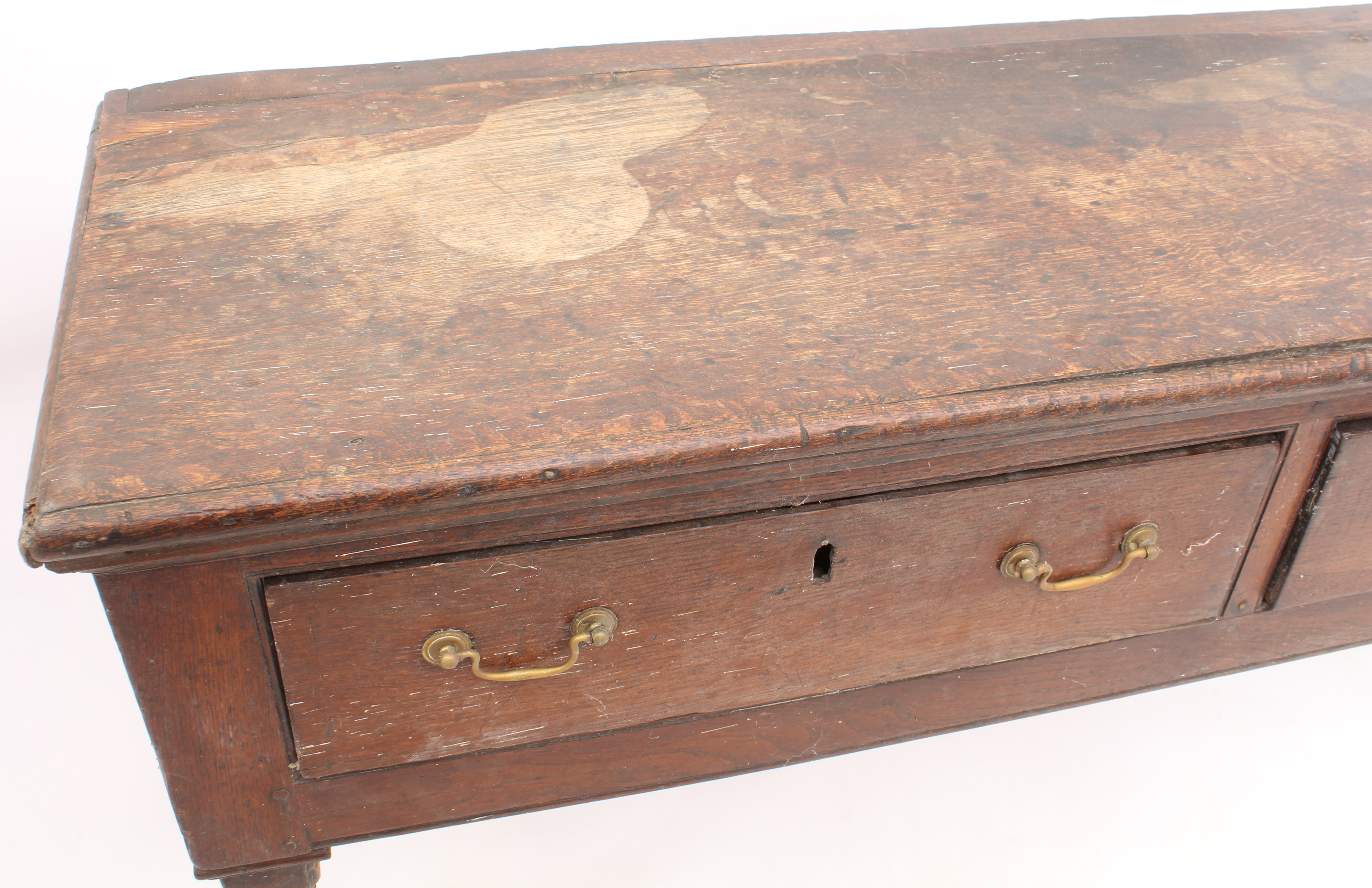 A late-18th century oak dresser base - the boarded top with applied half-round edge moulding, over - Image 4 of 4