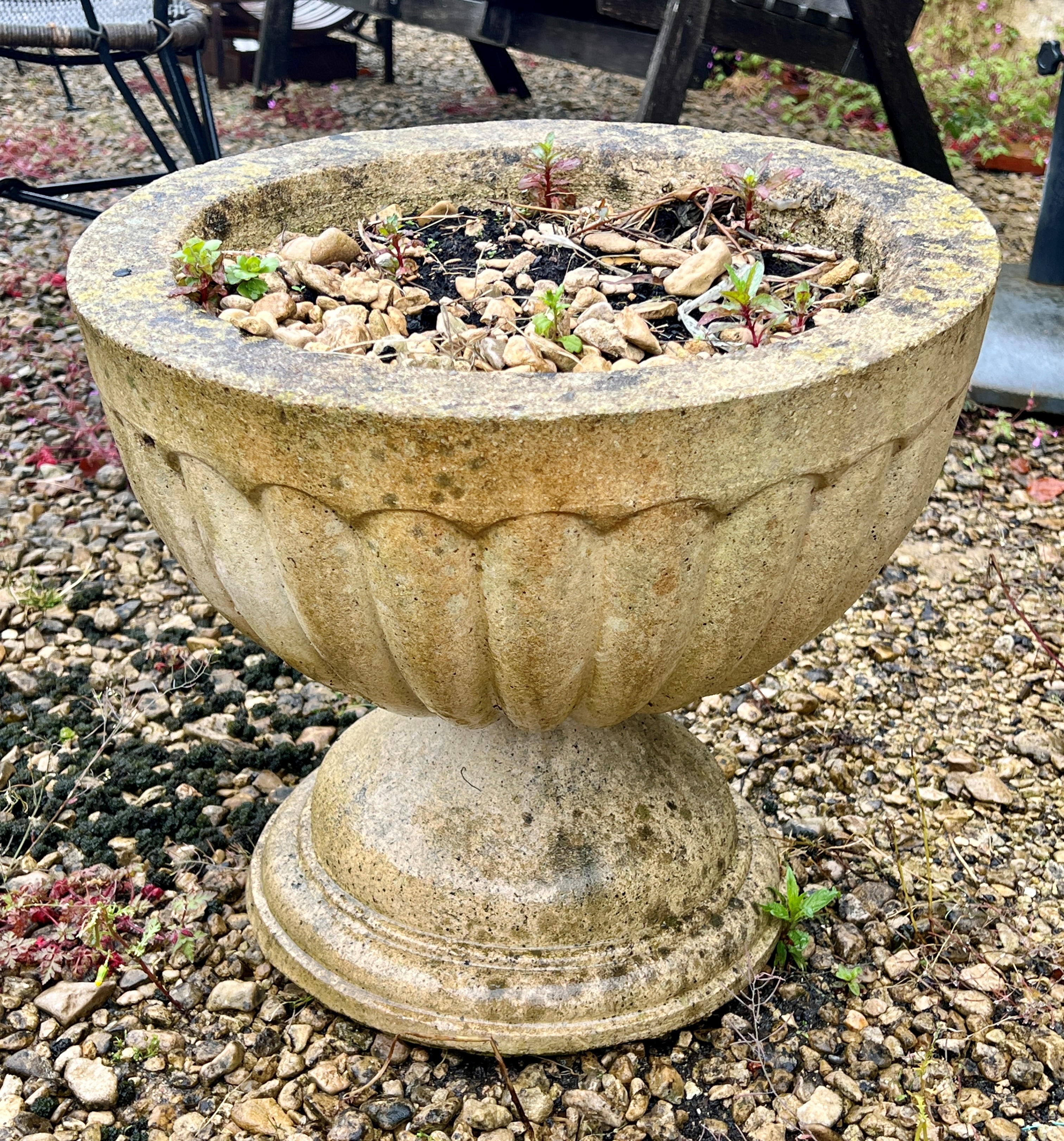 A composite stone circular planter on pedestal base - the bowl 44cm diameter, 38cm high.