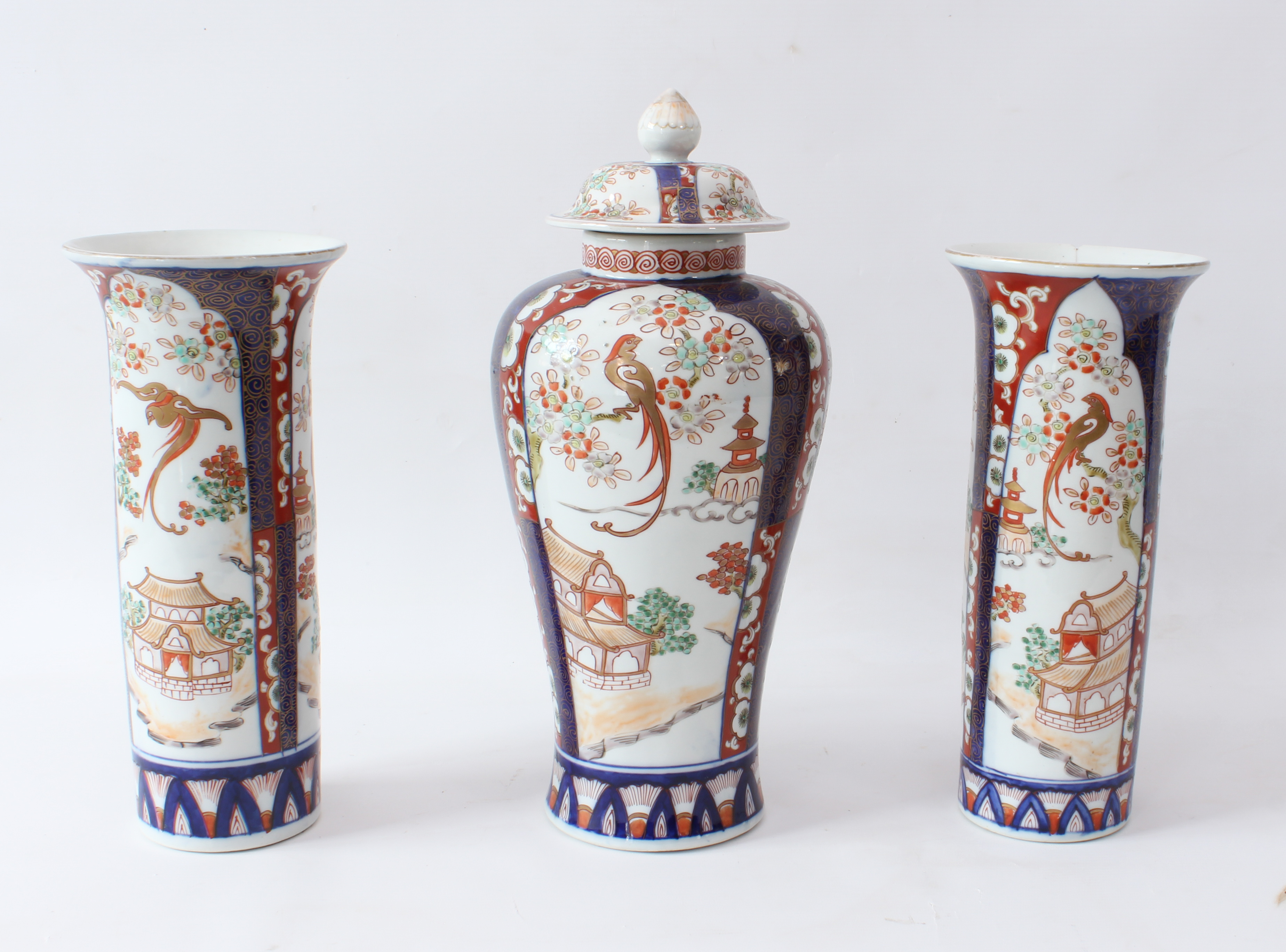 A garniture of three Japanese porcelain Imari decorated vases - early 20th century, comprising a - Image 2 of 4