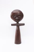 An African tribal carved hardwood Ashanti Akuaba fertility doll - 20th century, the disc-shaped head