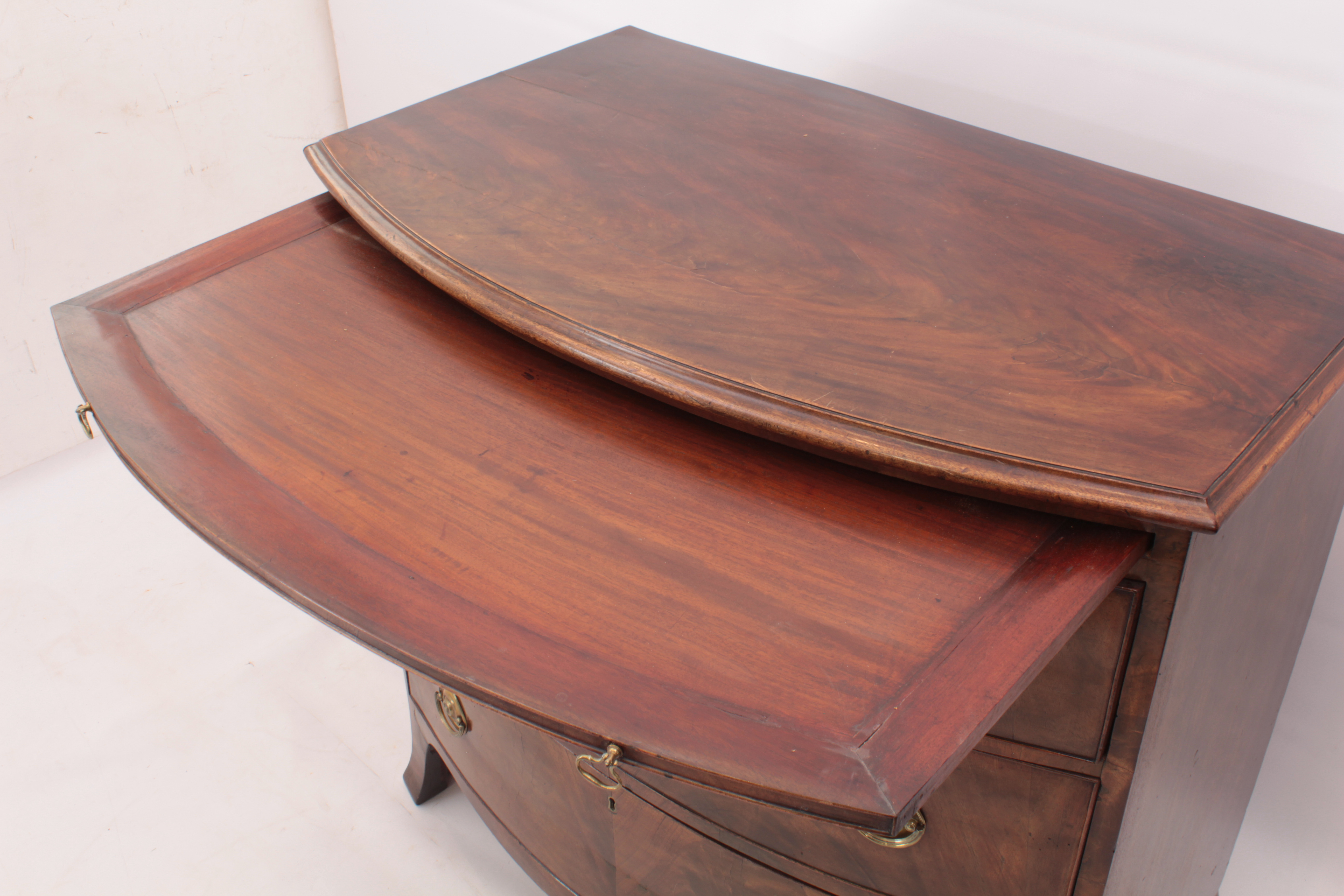 A bowfront mahogany chest of drawers - early 19th century, moulded top over a brushing slide, - Image 4 of 7