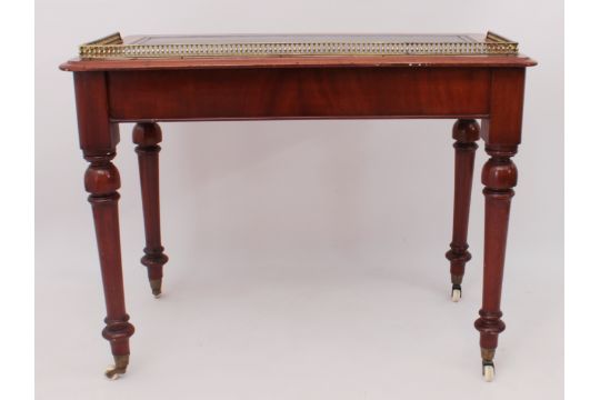 A mid-19th century mahogany two drawer writing table - the moulded top with inset dark green leather - Image 4 of 4