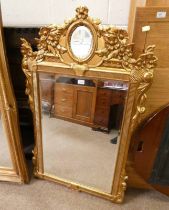 DECORATIVE CARVED GILT FRAME MIRROR WITH BEVELLED EDGE,