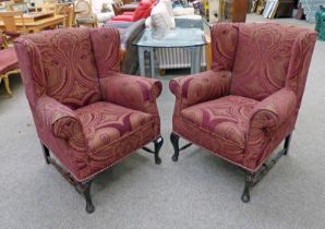 PAIR OF WINGBACK ARMCHAIRS ON MAHOGANY QUEEN ANNE SUPPORTS Condition Report: Both
