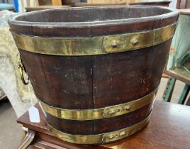 GILT METAL BOUND BUCKET / WINE COOLER WITH LION HEAD HANDLES,