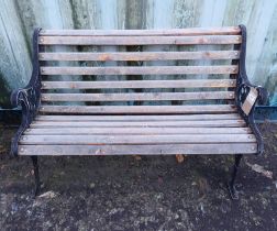 WOODEN GARDEN BENCH WITH PAINTED CAST METAL ENDS