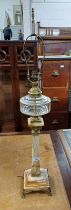 20TH CENTURY BRASS & HARD STONE PARAFFIN LAMP CONVERTED TO TABLE LAMP