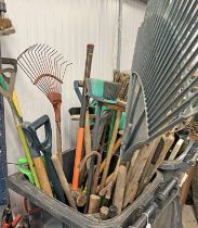 LARGE BIN CONTAINING VARIOUS GARDEN TOOLS TO INCLUDE BRUSHES, RAKES, SPADE, CROW BARS,