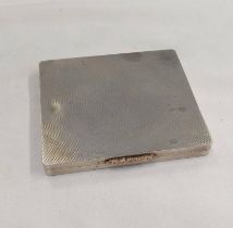 SILVER ENGINE TURNED CARD CASE WITH GILT INTERIOR,