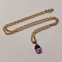 14CT GOLD AMETHYST SET PENDANT ON A 9CT GOLD CHAIN - 4.