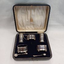 CASED SILVER 5 PIECE CRUET SET WITH BLUE GLASS LINERS,