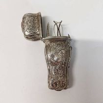 19TH CENTURY WHITE METAL ETUI CASE WITH EMBOSSED DECORATION,
