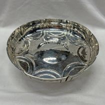 ARTS & CRAFTS SILVER CIRCULAR PEDESTAL BOWL WITH HAMMER EFFECT DECORATION & EMBOSSED PANELS BY