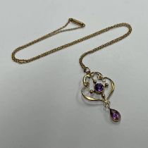 ART NOUVEAU GOLD PENDANT SET WITH AMETHYSTS ON A 9CT GOLD CHAIN - 3.