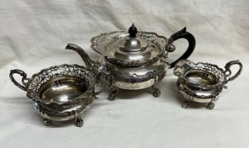 SILVER 3 PIECE TEASET WITH PIERCED DECORATION ON SCROLL SUPPORTS BY GOLDSMITHS & SILVERSMITHS CO