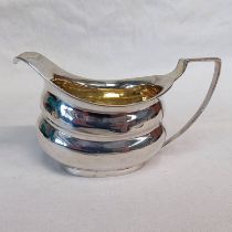 GEORGE III SILVER CREAM JUG BY JAMES TURNER,