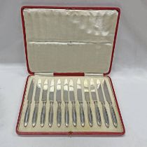 CASED SET OF 12 SILVER HANDLED TEA KNIVES, SHEFFIELD 1916 IN A WHYTOCK & SONS,