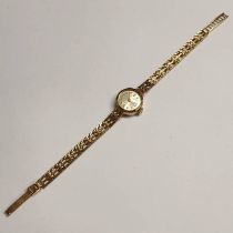 9CT GOLD LADIES AVIA WRISTWATCH - 9CT GOLD BRACELET - 17.5 CM LONG, 11.