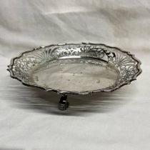 SILVER BOWL WITH RAISED PIERCED BORDER ON 3 SCROLL SUPPORTS, LONDON 1900 - 24.