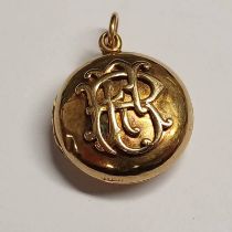 EARLY 20TH CENTURY GOLD CIRCULAR LOCKET WITH MONOGRAM TO FRONT - 5.