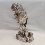 SILVER MODEL OF A TAWNY OWL STANDING ON A BRANCH,