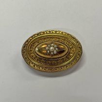 19TH CENTURY GOLD OVAL BROOCH WITH PEARL STARBURST DECORATION - 4.