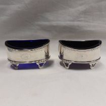 PAIR OF GEORGE III SILVER OVAL SALTS ON 4 PIERCED FEET WITH BLUE GLASS LINERS BY HAMPSTON,