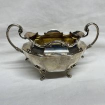 SILVER 2-HANDLED SUGAR BOWL ON 4 PAW FEET,