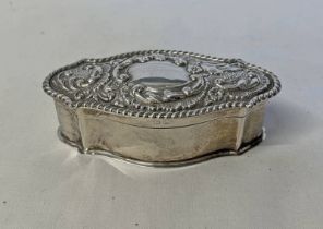 SILVER OVAL TRINKET BOX WITH EMBOSSED DECORATION, BIRMINGHAM 1901 - 10.