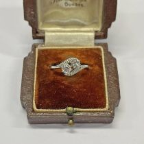 EARLY 20TH CENTURY DIAMOND 2-STONE TWIST RING WITH DIAMOND SET SHOULDERS,