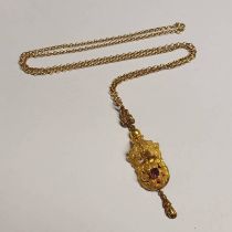 19TH CENTURY GOLD GARNET SET FOLIATE PENDANT ON A 9CT GOLD CHAIN - 6.