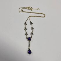 EARLY 20TH CENTURY 9CT GOLD AMETHYST & DIAMOND PENDANT NECKLACE WITH A PEAR SHAPED AMETHYST