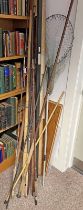 SELECTION OF VARIOUS FISHING RODS TO INCLUDE A GAFF AND A LANDING NET