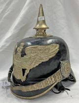 AGED COPY OF A PRUSSIAN PICKELHAUBE HELMET WITH LEATHER BODY,