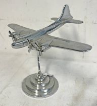 METAL MODEL OF A 4 PROPELLER AIR CRAFT ON STAND, 27.