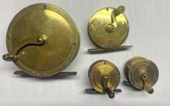 FOUR VARIOUS ALL BRASS WINCH REELS WITH CRANK-WINDING ARMS 4' AND SMALLER