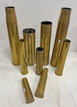 9 BRASS ARTILLERY SHELL CASES, TALLEST 44.