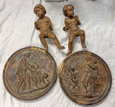 PAIR OF PAINTED CIRCULAR TERRACOTTA PLAQUES WITH CLASSICAL SCENES 29CM ACROSS AND A PAIR OF CARVED