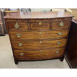 19TH CENTURY INLAID MAHOGANY BOW FRONT CHEST OF 3 SHORT OVER 3 LONG GRADUATED DRAWERS.