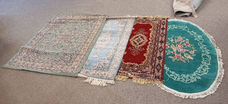 MIDDLE EASTERN STYLE RUG WITH RED & GOLD PATTERN RUG WITH BLUE & CREAM PATTERN & 2 OTHER RUGS.