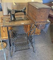 OAK SINGER SEWING TABLE WITH SEWING MACHINE & SINGLE DRAWER ON CAST IRON TREADLE .