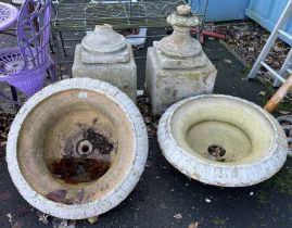 PAIR OF RECONSTITUTED STONE GARDEN PLANTERS ON SQUARE PLINTH BASES - AS FOUND.