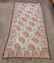 LARGE PAISLEY SHAWL WITH FLORAL SEWNWORK PATTERN THROUGHOUT AND FRINGED EDGES,