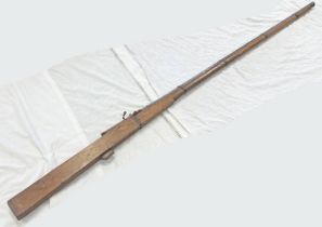 19TH CENTURY INDIAN MATCH LOCK RAMPART GUN WITH 178 CM LONG BARREL WITH WOODEN STOCK,