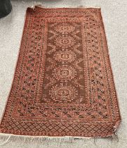 RED GROUND MIDDLE EASTERN CARPET,