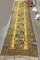 YELLOW GROUND MIDDLE EASTERN CARPET - 330 X 85 CM