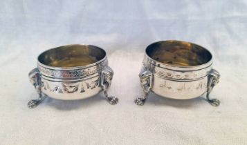 PAIR OF VICTORIAN SILVER PLATED EGYPTIAN REVIVAL CIRCULAR SALTS WITH SPHINX MASK LIONS PAW FEET