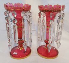 PAIR OF CRANBERRY GLASS DISPLAY LUSTRES WITH HANGING CUT-GLASS DROPLETS,